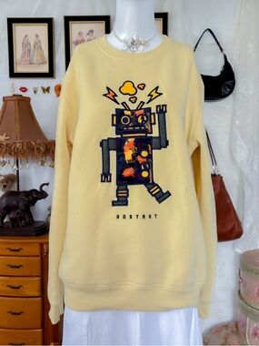 Casual retro streetwear urban style robot graphic butter yellow crewneck
